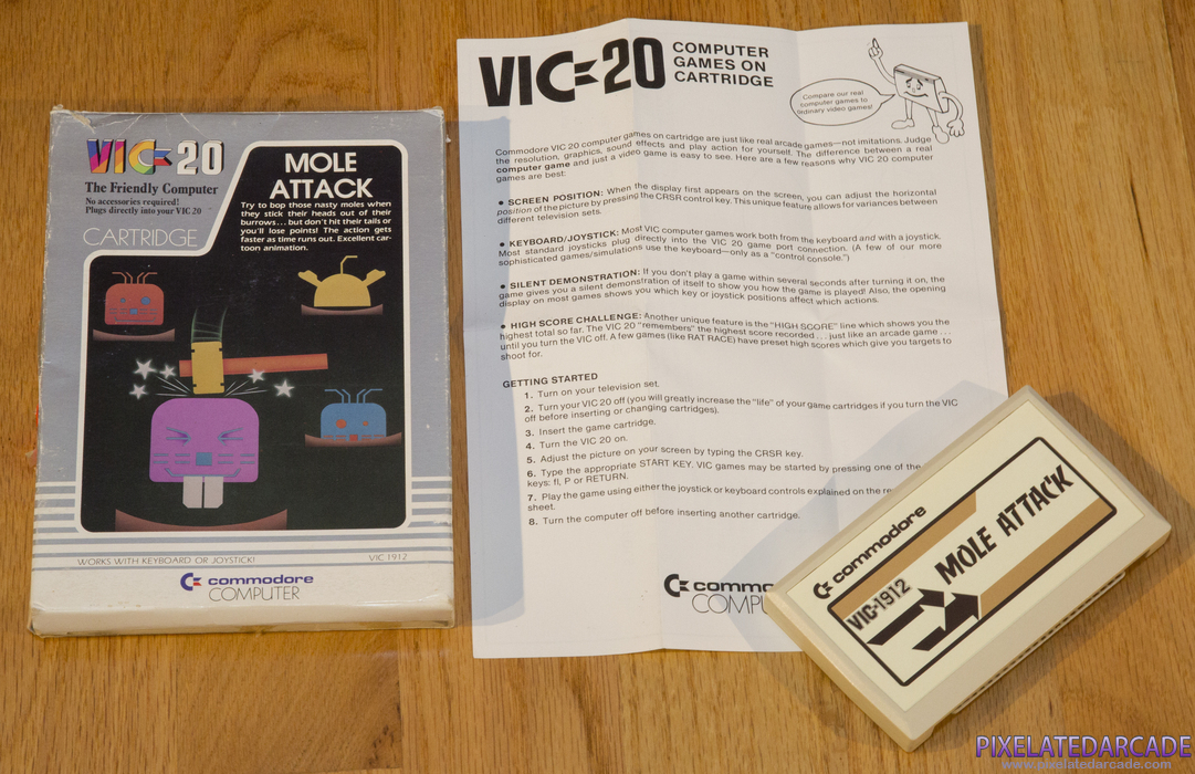 Mole Attack Cover Art: Box and contents Mole Attack Cover Art: Box and contents