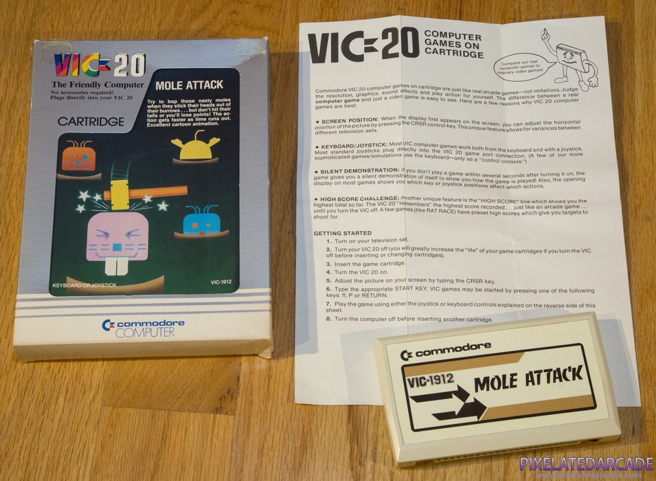 Mole Attack Cover Art: Box and contents Mole Attack Cover Art: Box and contents