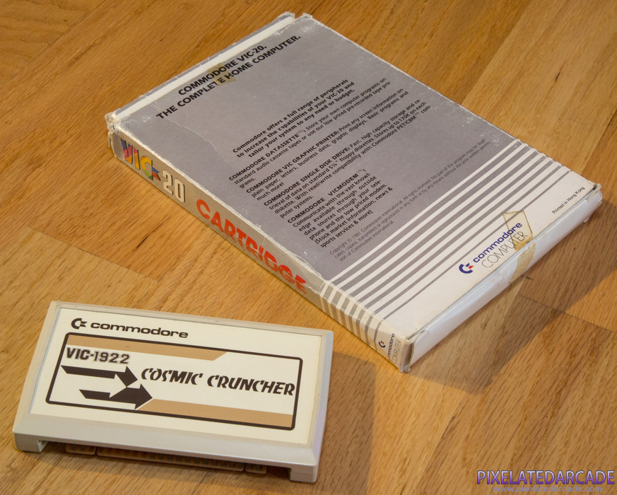 Cosmic Cruncher Cover Art: Box and cartridge Cosmic Cruncher Cover Art: Box and cartridge