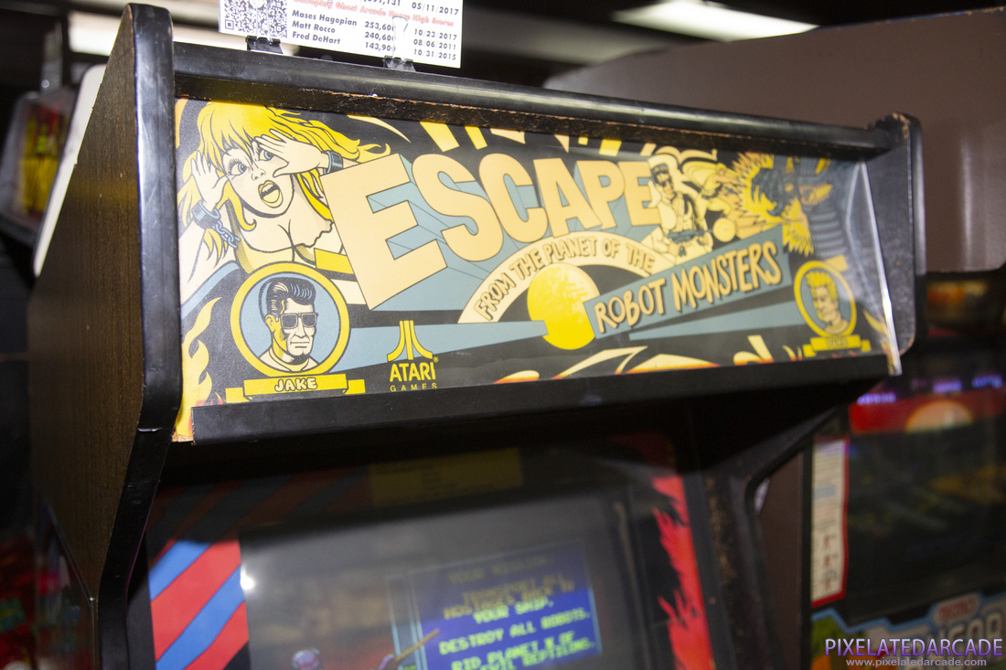 Escape from the Planet of the Robot Monsters Photo: Escape from the Planet of the Robot Monsters arcade cabinet - Marquee