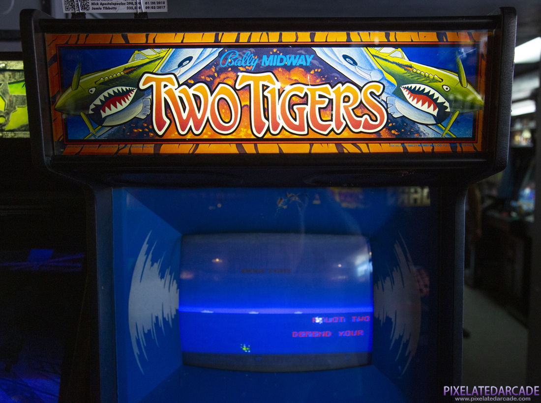 Two Tigers Photo: Two Tigers arcade cabinet - Marquee and monitor