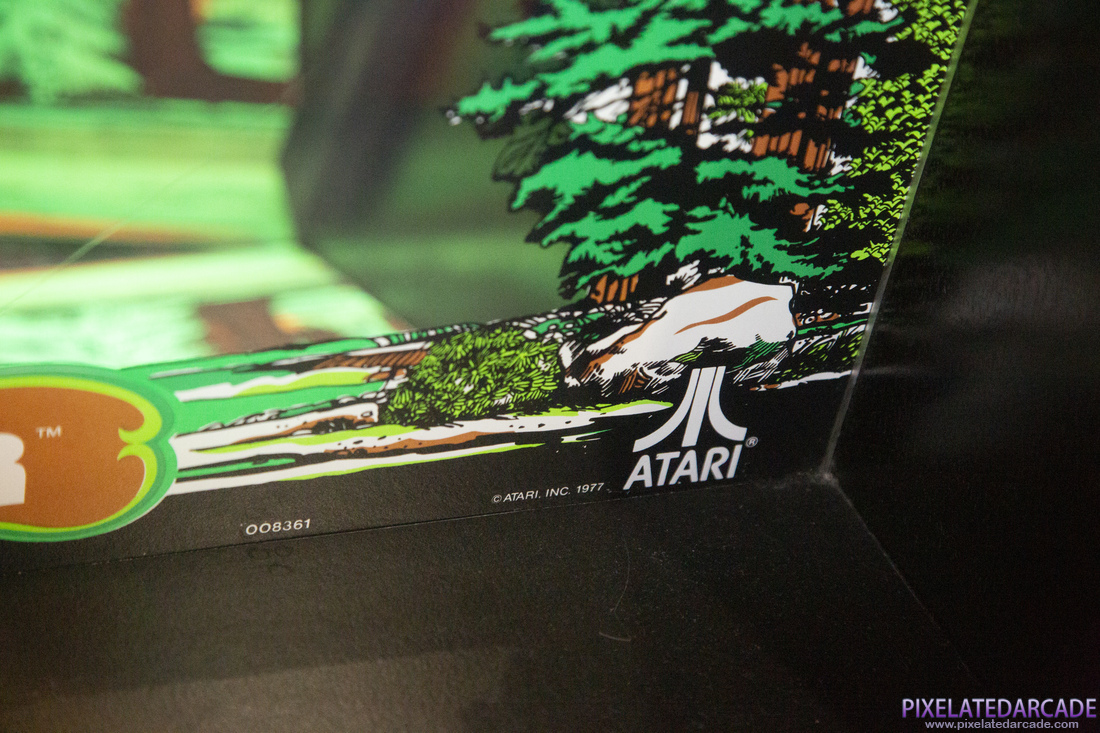 Triple Hunt Photo: Hit the Bear cabinet - Bezel closeup