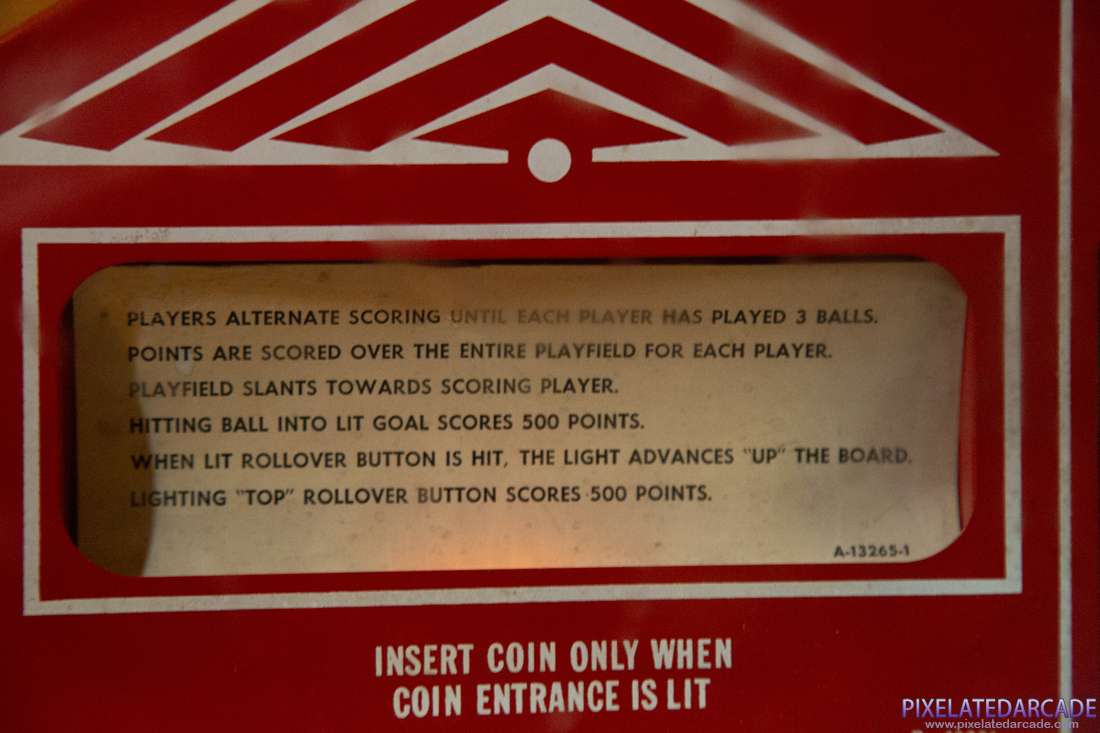 Challenger Photo: Challenger pinball cabinet - Red player instruction card
