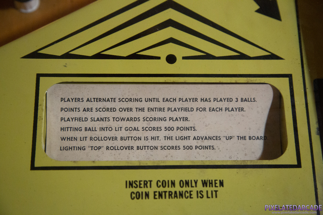 Challenger Photo: Challenger pinball cabinet - Yellow player instruction card