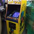 Super Pac-Man in yellow Pac-Man cabinet