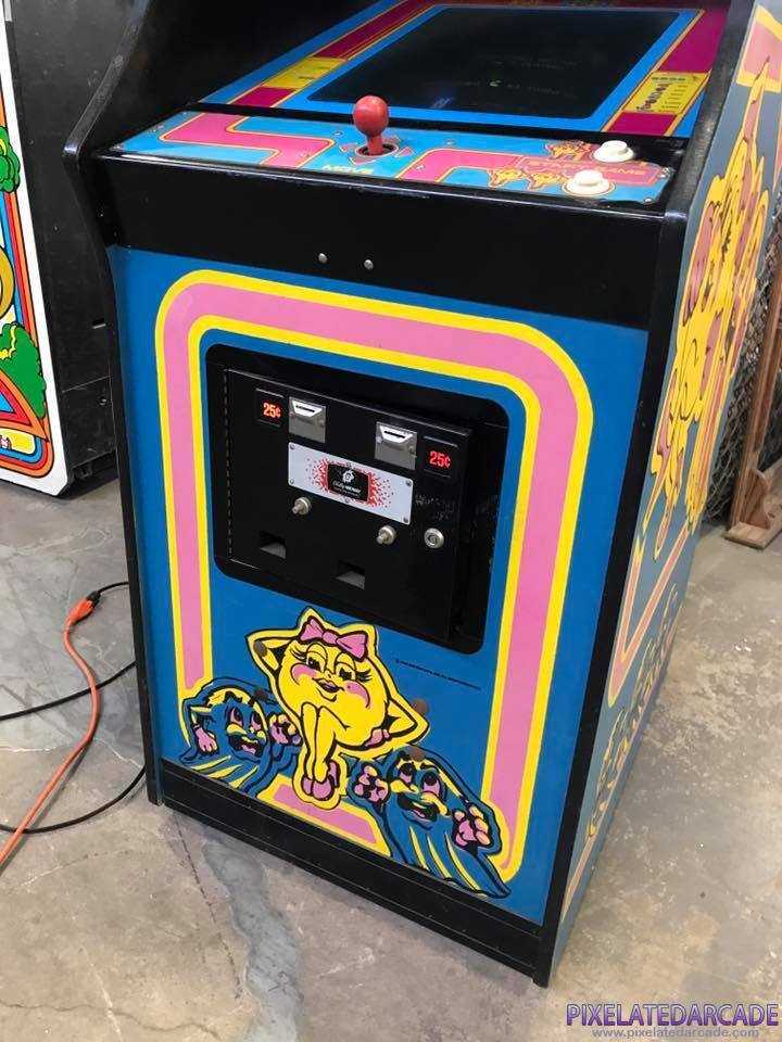 Ms. Pac-Man Photo: Ms. Pac-Man arcade cabinet - front artwork and coin box