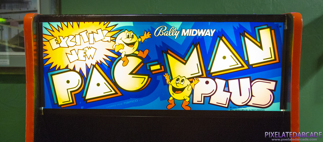 Pac-Man Plus Photo: Pac-Man Plus arcade cabinet - Marquee