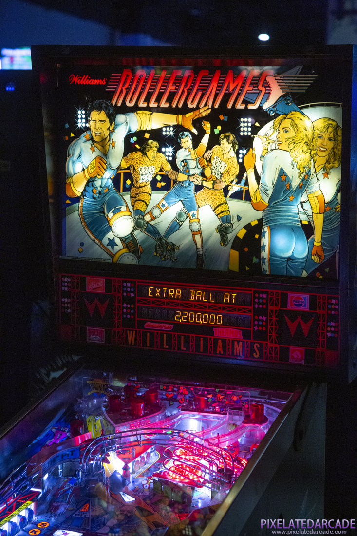 Rollergames Photo: Rollergames backbox and upper playfield illuminated.