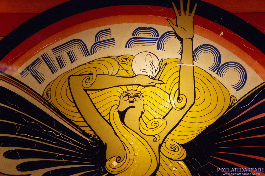 Time 2000 Photo: Backglass detail - Time 2000 logo