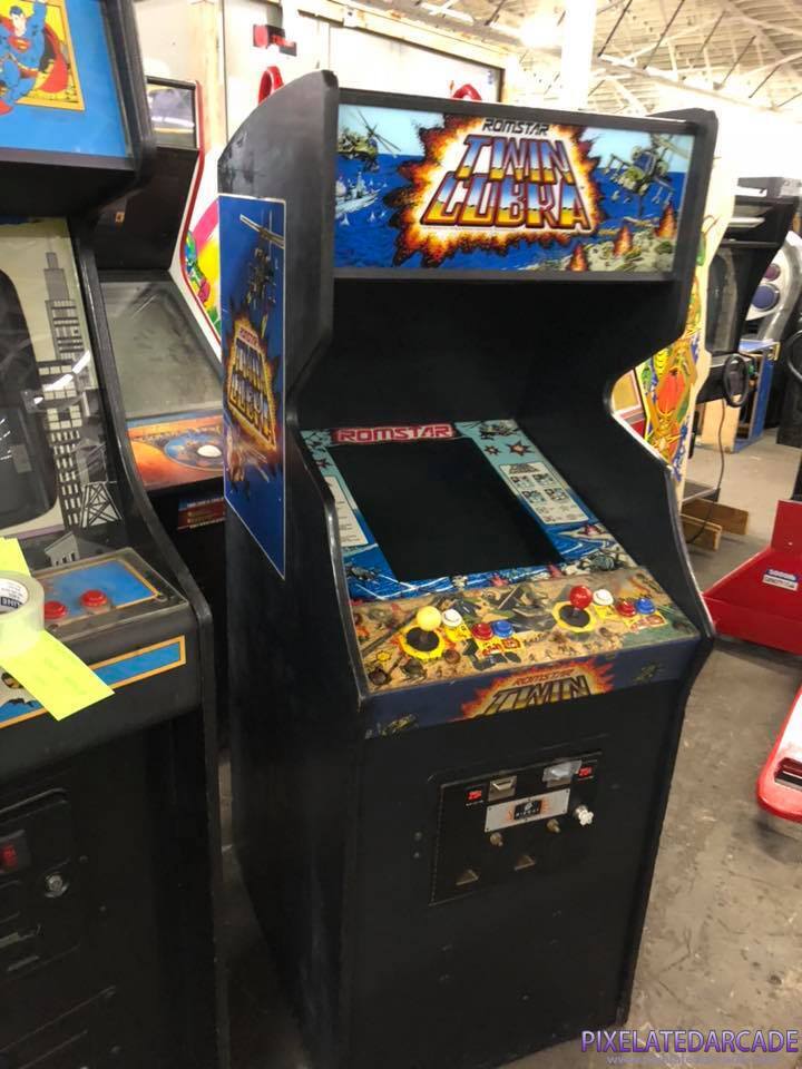 Twin Cobra Photo: Twin Cobra in Super Pac-Man cabinet.