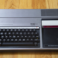 TI-99/4A computer with Hustle cartridge