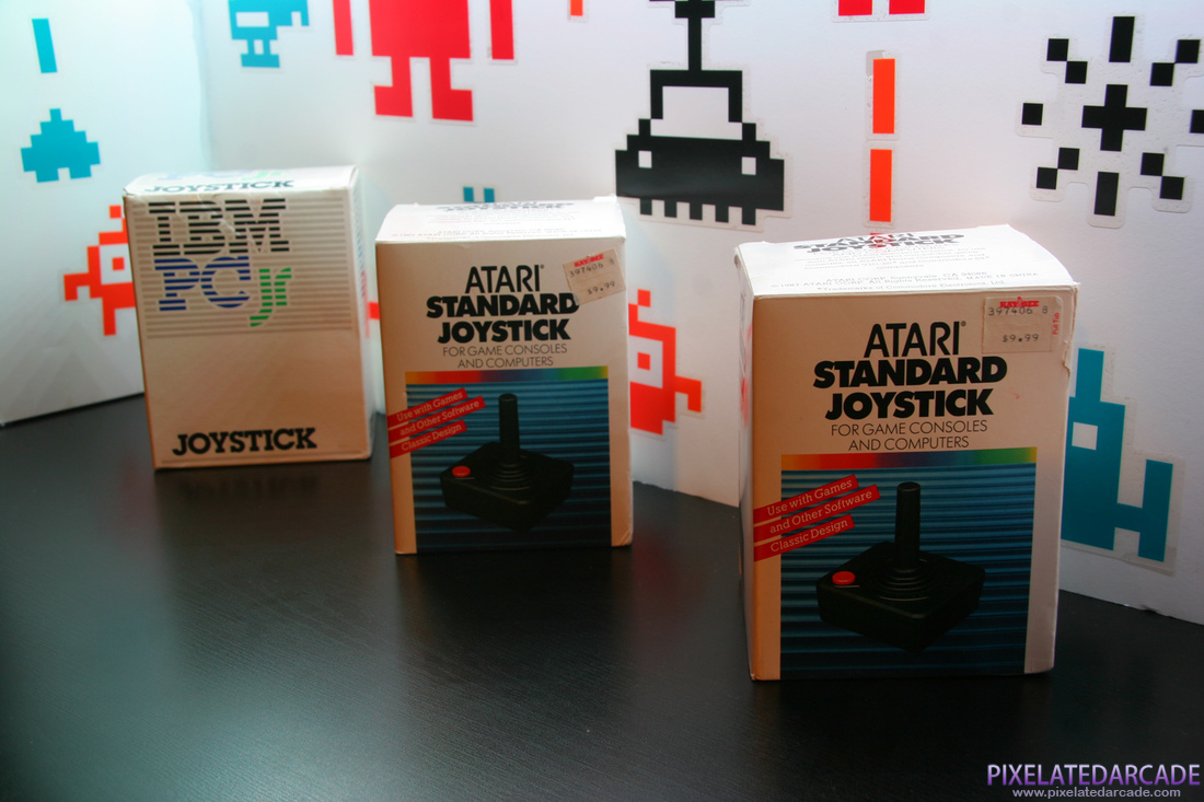 Joystick Photo: IBM PCjr and Atari 2600 joystick boxes