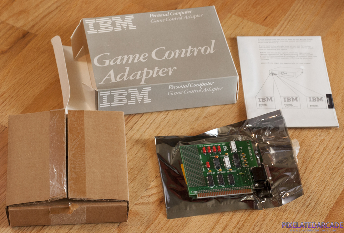 Joystick Photo: IBM Game Control Adapter - Box and contents