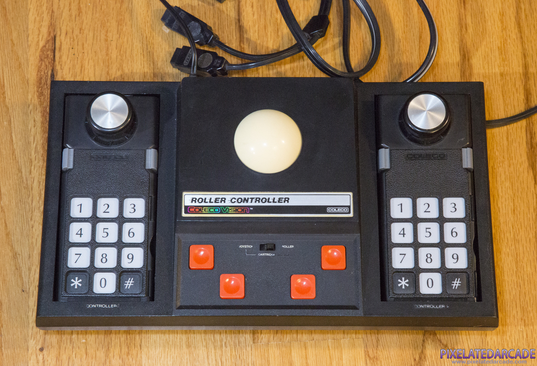 Roller Controller Photo: ColecoVision Roller Controller with controllers in storage bay