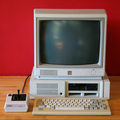 IBM PCjr computer with color display, revised keyboard, and joystick
