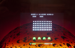 Space Invaders with moon backdrop