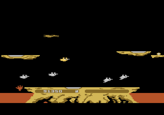 Joust Atari 5200 Screenshot: Be sure to collect eggs before they hatch into new buzzards.