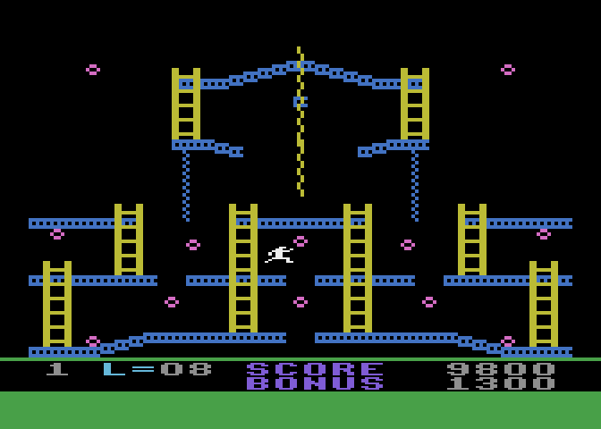 Jumpman Atari 8-bit Screenshot: Jumping across a gap...