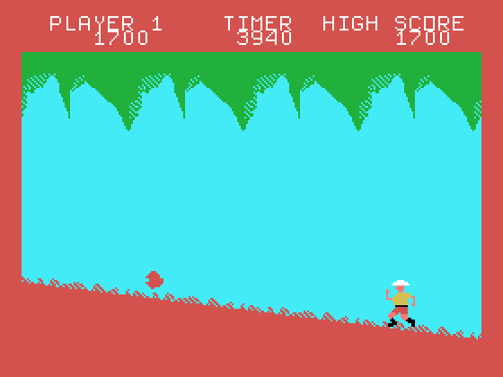 Jungle Hunt TI-99/4A Screenshot: Jump over the incoming boulders...