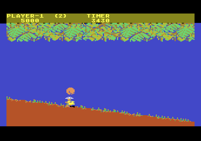 Jungle Hunt Atari 5200 Screenshot: With larger boulders you can attempt to duck under them.