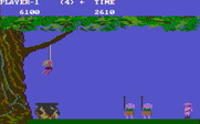 Jungle Hunt for IBM PC/Compatibles - Jump over the natives to rescue the girl.