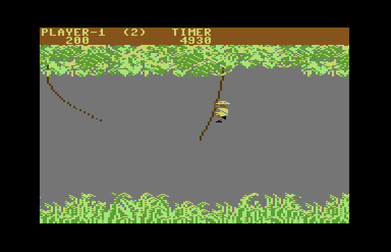 Jungle Hunt Commodore 64 Screenshot: Swinging on vines...
