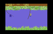 Jungle Hunt for Commodore 64 - On advanced levels, monkeys are on the vines and will knock you off!