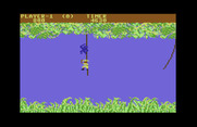 Jungle Hunt for Commodore 64 - Careful timing is needed to avoid the monkeys...