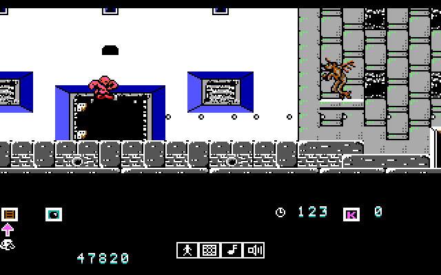 Karnov IBM PC/Compatibles Screenshot: Jumping through the air.