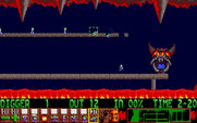 Lemmings for Amiga - Dig through the floor to reach a safe falling height.