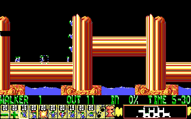 Lemmings IBM PC/Compatibles Screenshot: Climbers make their way up a wall.