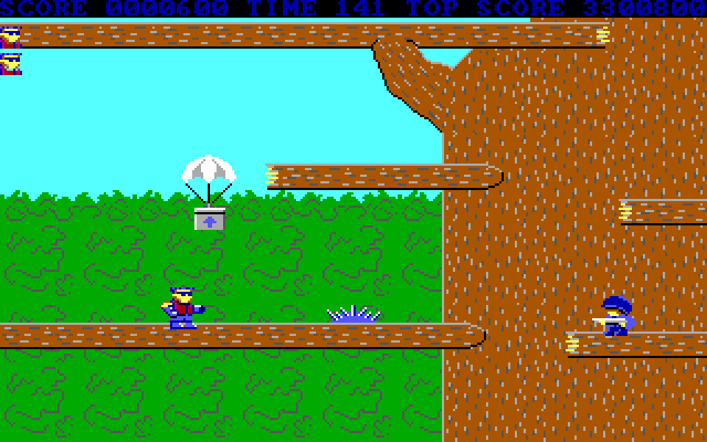 Bionic Commando IBM PC/Compatibles Screenshot: A bonus item is parachuting in!