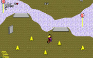 Paperboy 2 for IBM PC/Compatibles - Use the ramps to jump over the water.