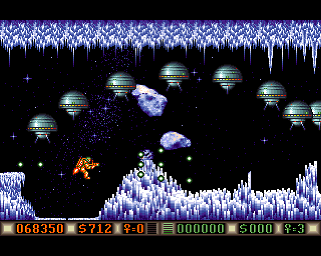 Blood Money Amiga Screenshot: Shoot the green saucers to earn some money...