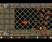 Blood Money for Amiga - Shooting past numerous enemies!