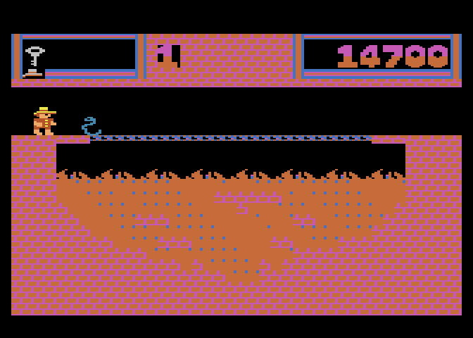Montezuma's Revenge Atari 5200 Screenshot: That bridge over the fire disappears sometimes making this room tough.