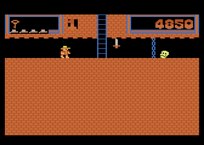Montezuma's Revenge Atari 5200 Screenshot: Head up the ladder, or try to sneak past that skull?