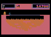 Montezuma's Revenge for Atari 5200 - That bridge over the fire disappears sometimes making this room tough.