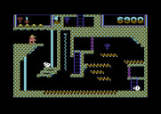 Montezuma's Revenge for Commodore 64 - This screen has a lot of conveyor belts to navigate.