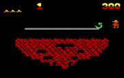 Montezuma's Revenge for IBM PC/Compatibles - Don't fall in the fire when this bridge dissappears...