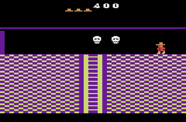 Montezuma's Revenge Atari 2600 Screenshot: Either jump over or duck under these bouncing skulls...