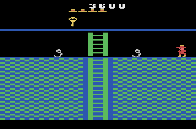 Montezuma's Revenge Atari 2600 Screenshot: This ladder is guarded by snakes...