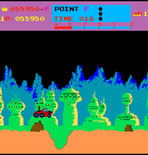 Moon Patrol for Arcade - Attempting jump over rocks and a crater.