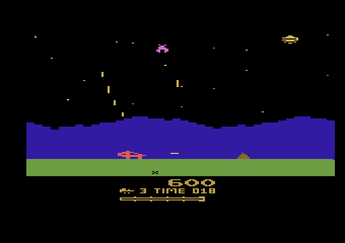 Moon Patrol Atari 2600 Screenshot: The "X" in the ground indicates the end of a level.
