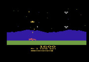 Moon Patrol for Atari 2600 - Those white aliens create new craters when they bomb the ground.
