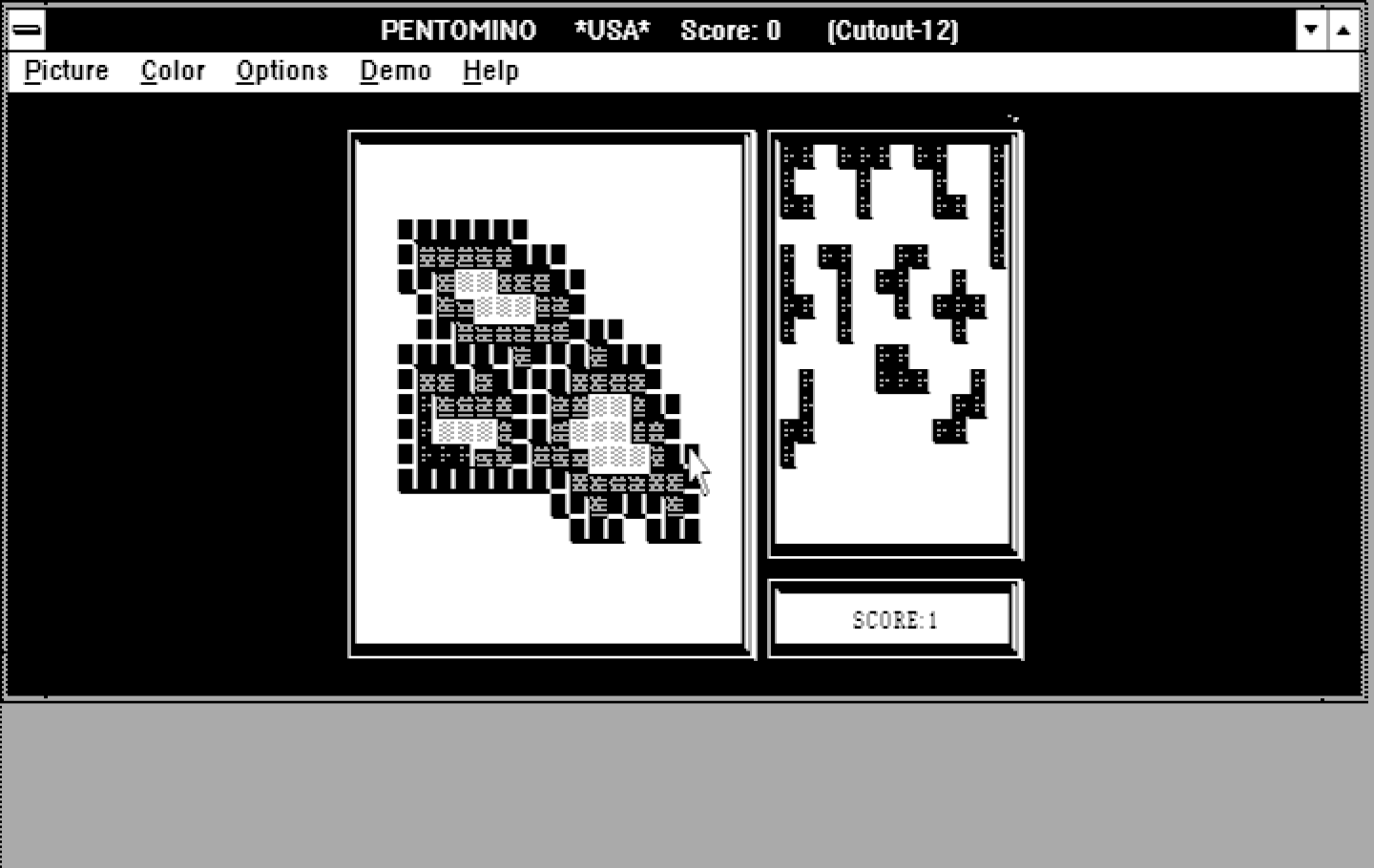 Pentomino Windows 3.x Screenshot: Numerous puzzles are included with different layouts and difficulties.