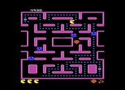 Ms. Pac-Man for Atari 7800 - Eat the fruit for bonus points.