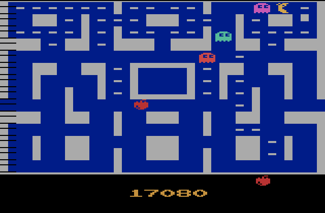 Ms. Pac-Man Atari 2600 Screenshot: Ghost in hot pursuit!