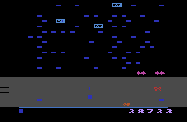 Millipede Atari 2600 Screenshot: Don't get hit by the ladybug walking along the bottom of the screen...