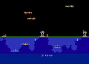 Atlantis for Atari 8-bit - As the game progresses enemies become faster and more numerous.